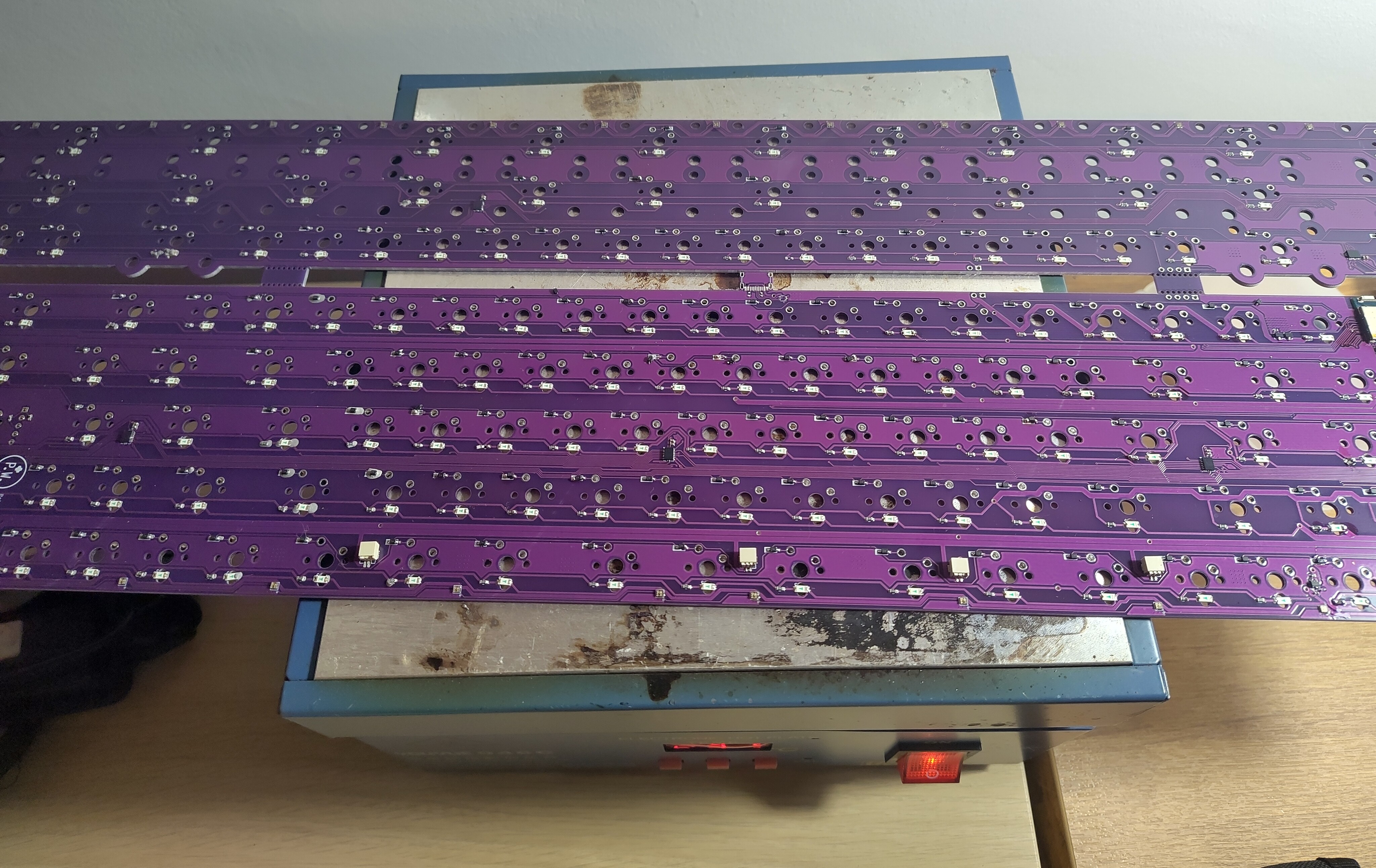 Reflowing the board on a reflow hotplate, the board is a lot larger than the hotplate