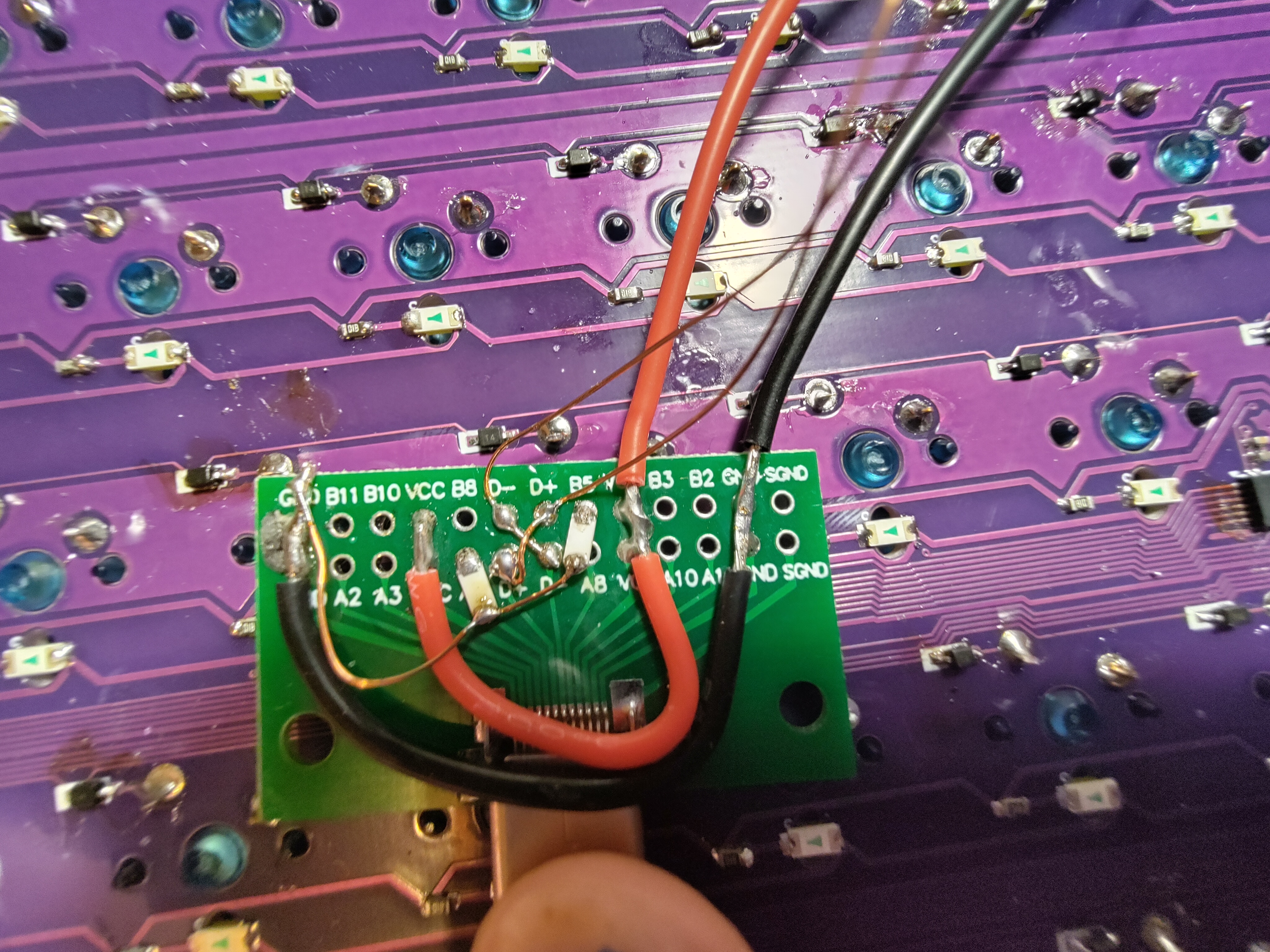 A USB type C breakout board bodge wired to connect to the board